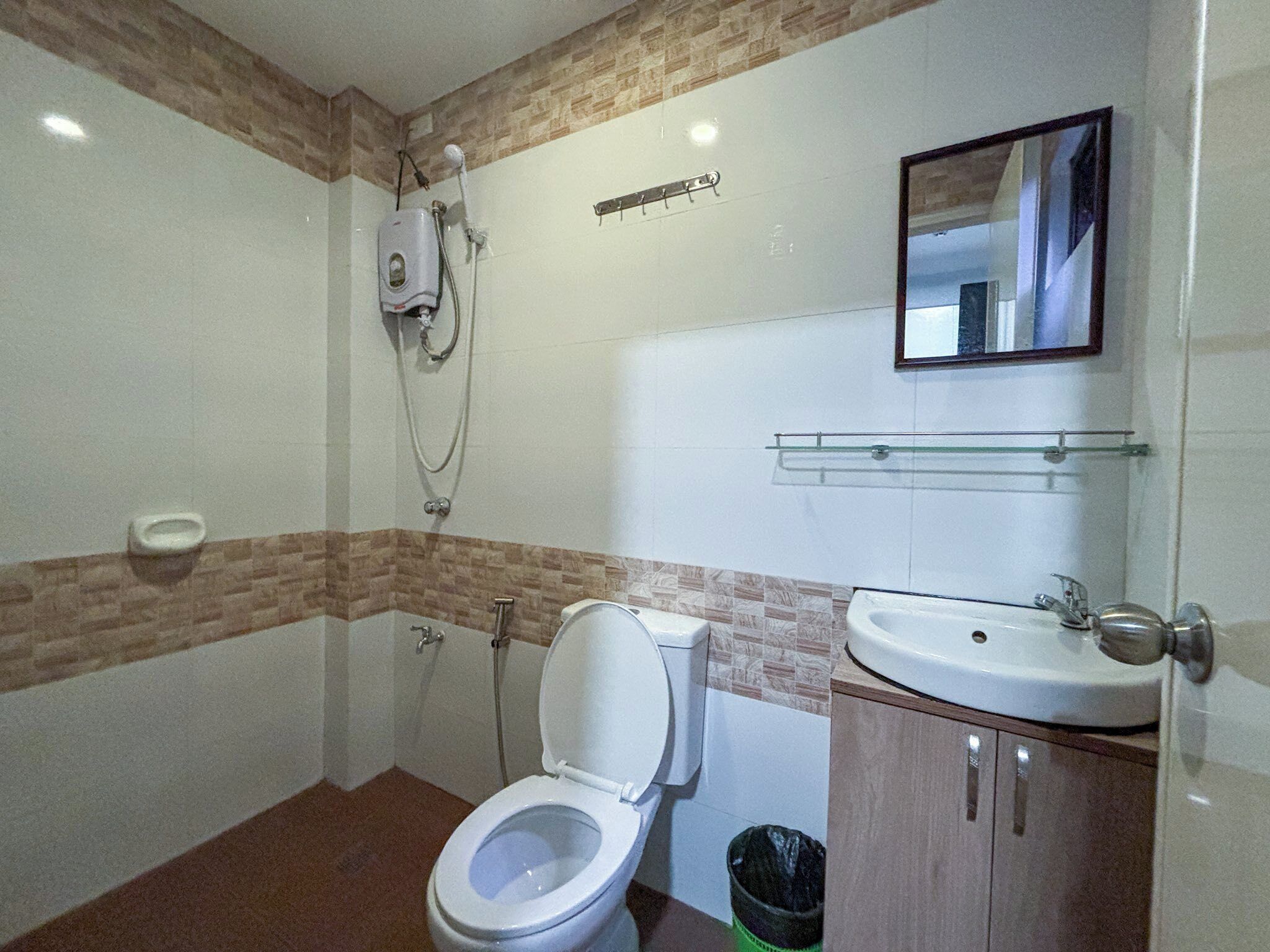Bidet, towels, soap, toilet paper