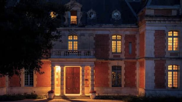 A large, historic building with a symmetrical facade, large windows, and a central entrance. - Stay at the Château- Studio 2P- with pool and park (Fajolles)