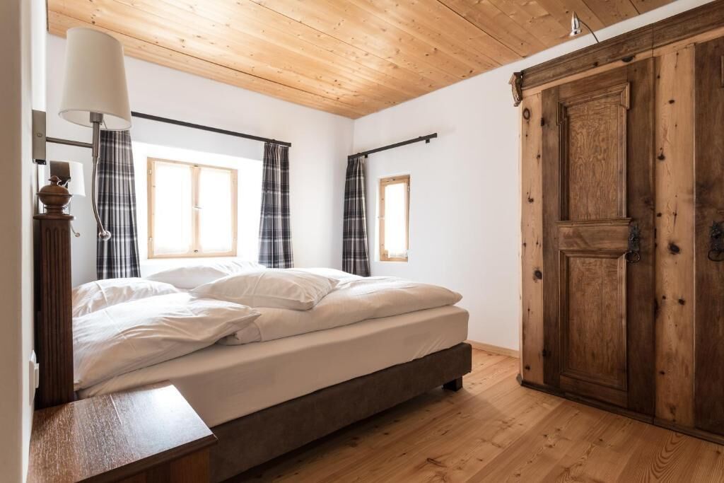 Suite Deluxe, vista montagna | Una cassaforte in camera, tende oscuranti, insonorizzazione