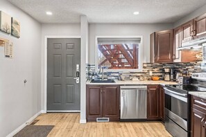 Fridge, microwave, oven, stovetop - 2BR Bow Valley Retreat with BBQ. Near Parks & Banff (Canmore)