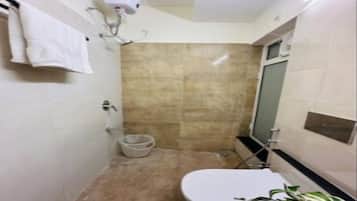 Shower, towels, soap, toilet paper