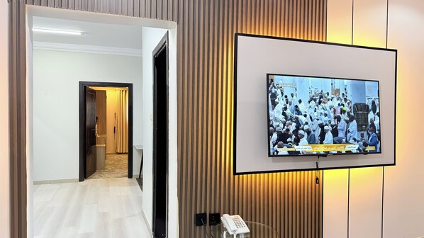 Family Suite, 2 Bedrooms | Living area | TV