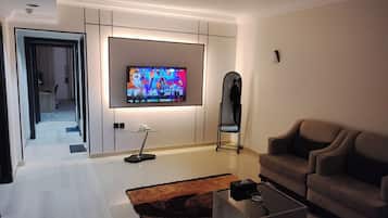 Tremannsrom – familie, byutsikt | Oppholdsområde