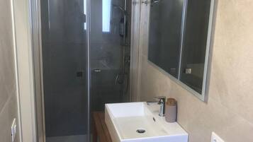 Shower, eco-friendly toiletries, hair dryer, bidet