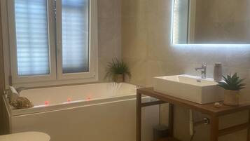 Shower, eco-friendly toiletries, hair dryer, bidet