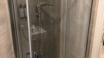 Shower, eco-friendly toiletries, hair dryer, bidet