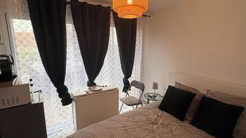 3 slaapkamers, een strijkplank/strijkijzer, wifi, beddengoed