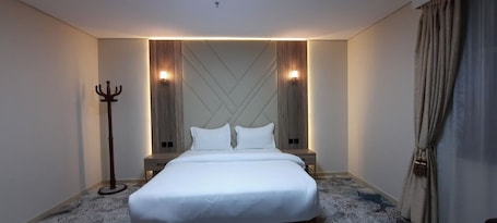 Caja de seguridad en la habitación y sistema de insonorización . Sadeem Al Fajr Hotel Suites