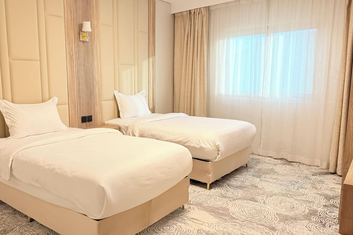 Family Suite, 2 Bedrooms | In-room safe, soundproofing, iron/ironing board, free WiFi