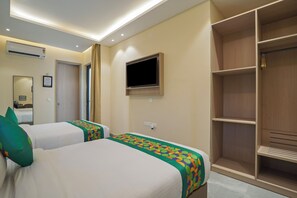 Habitación doble Deluxe | Tabla de planchar con plancha 