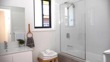 Hair dryer, towels, soap, toilet paper