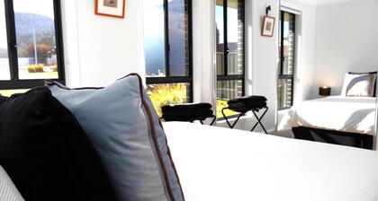 THE QUARTERS #1 Centrally located modern 2 bed unit featuring stylish decor