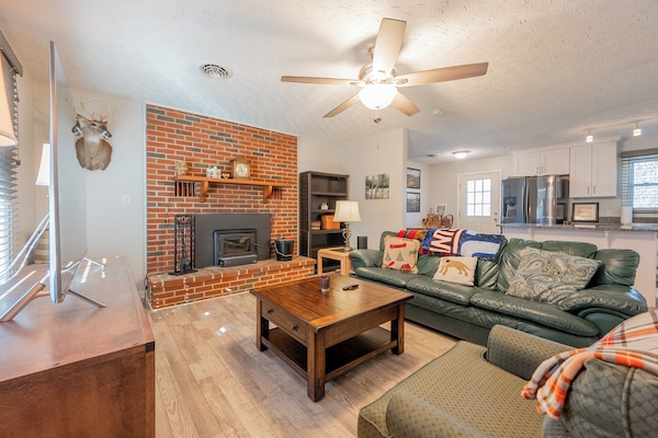 Your cozy retreat with a fireplace, plush seating, and modern touches
