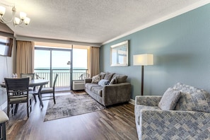 Signature Condo, 1 Bedroom, Hot Tub, Pool View | Living room | 45-inch Smart TV with cable channels - Caravelle Resort 1145 (Myrtle Beach)