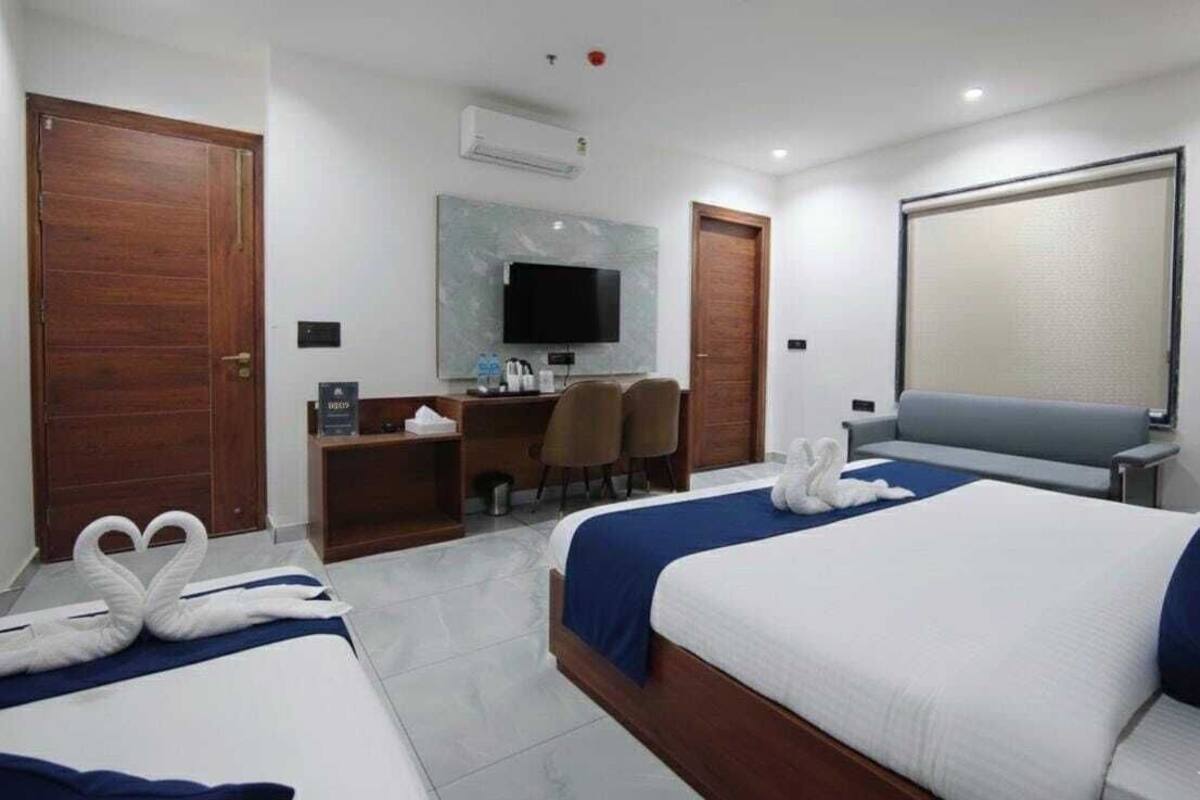 Chambre Luxe avec lits jumeaux, vue parc | Bureau, espace de travail pour ordinateur portable, Wi-Fi gratuit