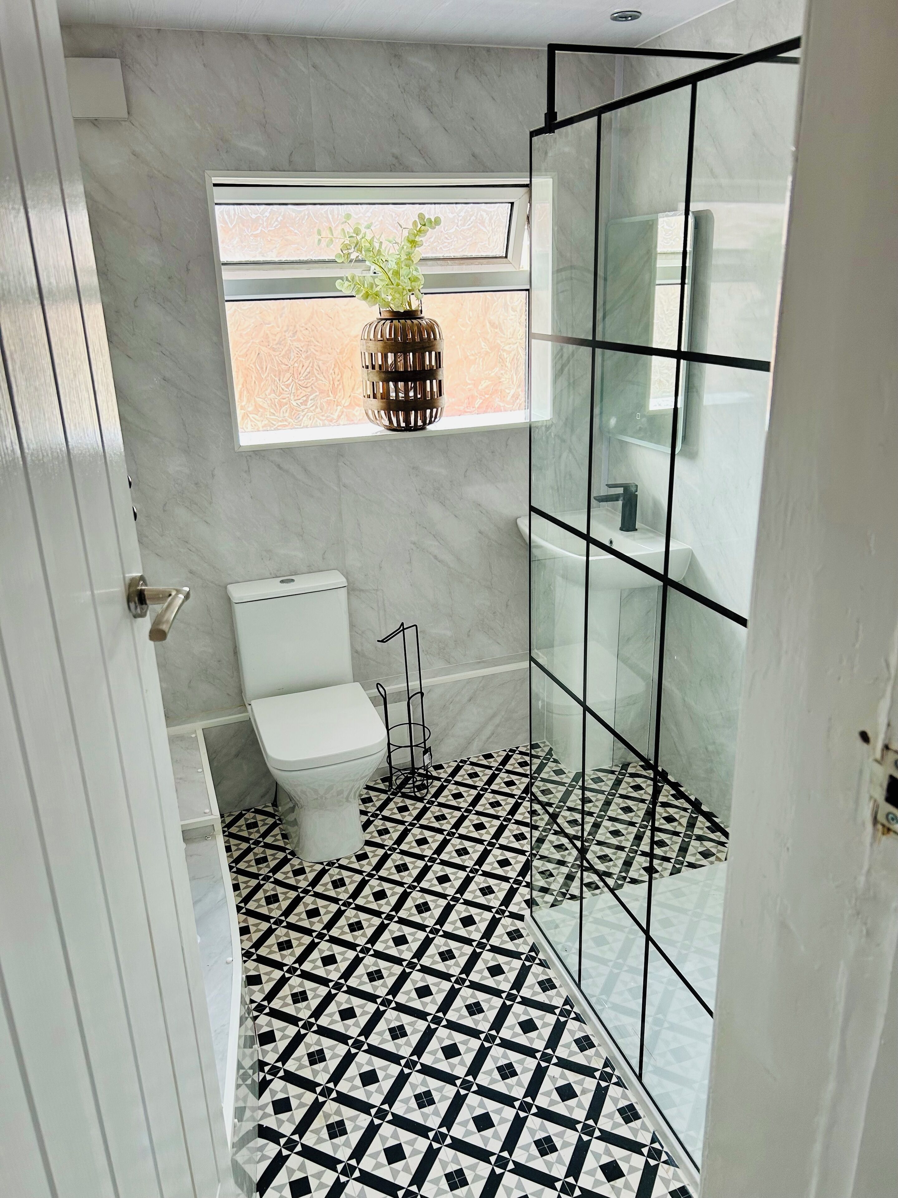 Shower, hair dryer, towels, toilet paper