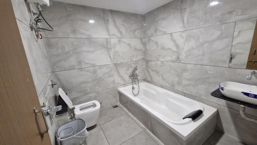 Shower, slippers, towels, soap