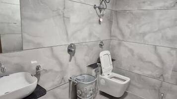 Shower, slippers, towels, soap