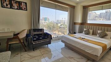 Deluxe Double Room, City View | Laptop workspace, iron/ironing board, free WiFi