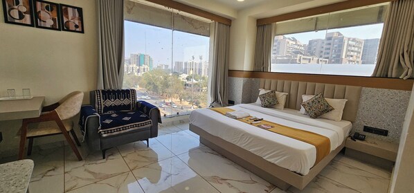 Deluxe Double Room, City View | Laptop workspace, iron/ironing board, free WiFi - Hotel Rose Gold (Ahmedabad)