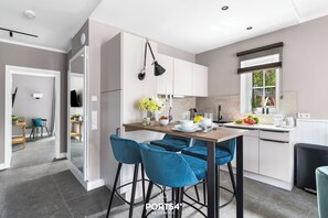 Fridge, microwave, oven, stovetop - The View A1 Küstenglück - Terrace, garden furniture, shared Sauna, parking space (Dagebüll)