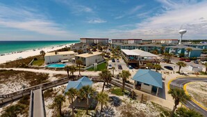 A coastal hotel with a pool, beach access, and a view of the ocean. - Seacrest 601ab 3 Bedroom Condo (Fort Walton Beach)