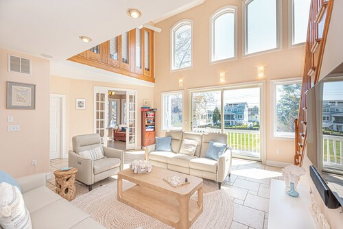 Dockside Daydream - Beautiful 4 Bed, 3.5 Bath South Bethany Beach Home with elevator only 1/2 mile walk to the beach with canal access and views