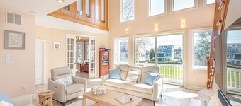 Dockside Daydream - Beautiful 4 Bed, 3.5 Bath South Bethany Beach Home with elevator only 1/2 mile walk to the beach with canal access and views