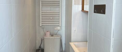 Hair dryer, towels, soap, toilet paper