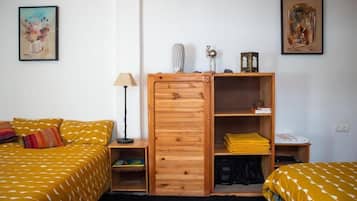 Family Quadruple Room, Terrace, Beachside | Individually decorated, laptop workspace, blackout curtains