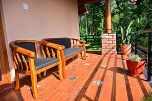 Luxe cottage, uitzicht op tuin | Terras