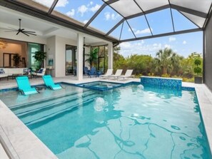 Pool - Indulge in refined waterfront living at this exceptional custom-built residence located in the peaceful community of South Gulf Cove (Port Charlotte)
