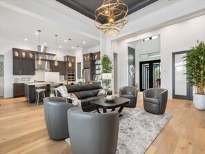Living area - Indulge in refined waterfront living at this exceptional custom-built residence located in the peaceful community of South Gulf Cove (Port Charlotte)