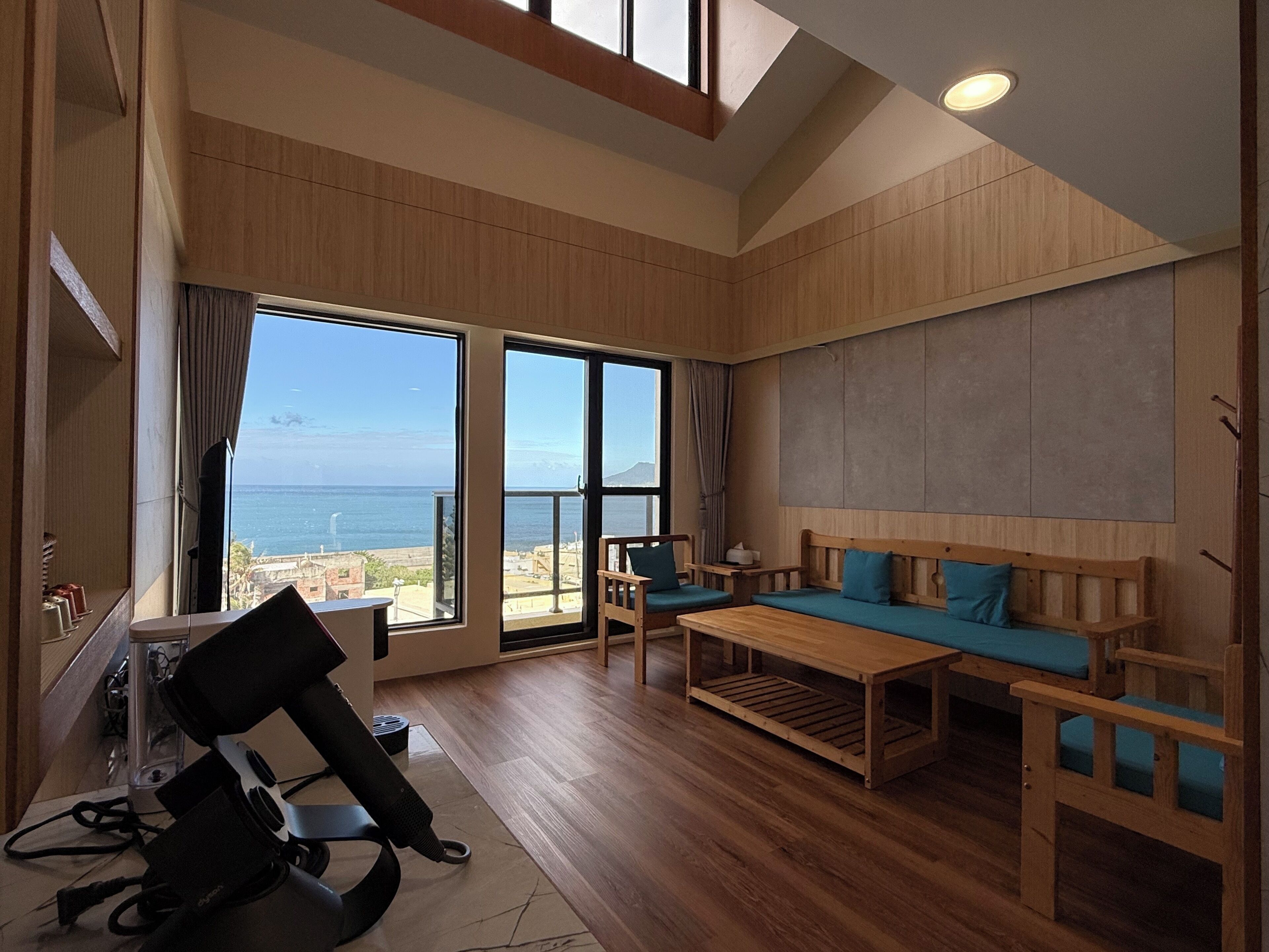 Exclusive Loft, Ocean View | Living area | 55-inch flat-screen TV with digital channels