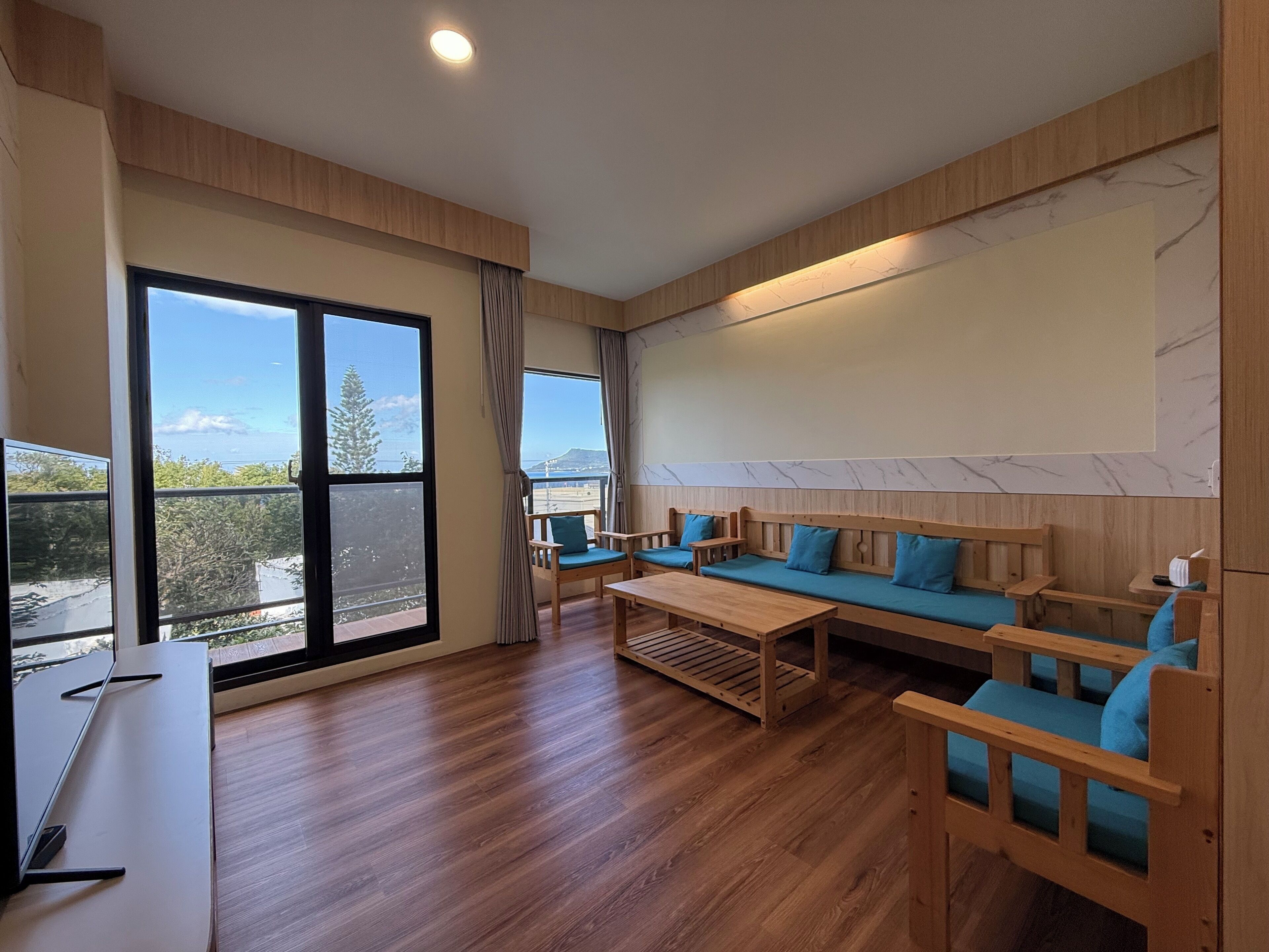 Luxury-Vierbettzimmer, Meerblick | Wohnbereich