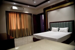 Deluxe Double Room, City View | Desk, laptop workspace, free WiFi - The shark inn Residency (Huzur)