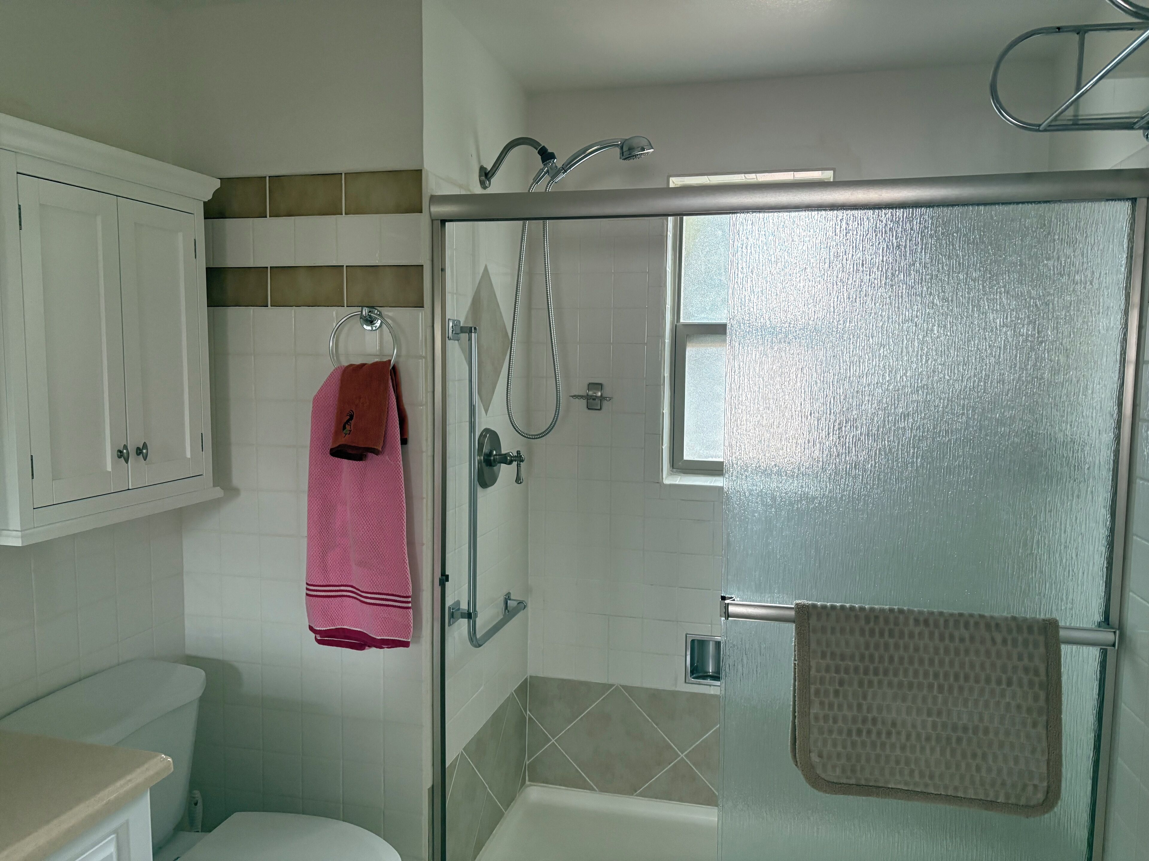 Shower, towels, soap, toilet paper