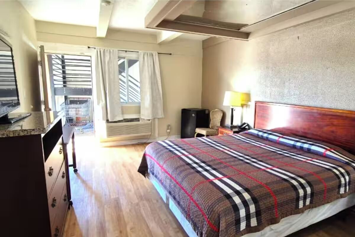 Step into a bright, spacious room made for restful nights.