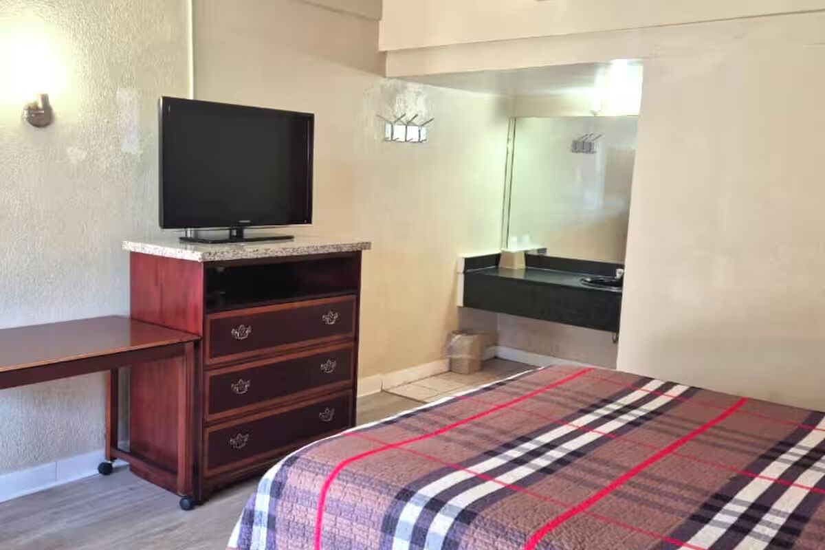 Get ready with convenient in-room vanity and entertainment nearby.