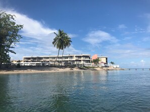 On the beach, sun-loungers, beach towels - 1BR beachfront stay with walk-out beach access and kayak (Cabo Rojo)