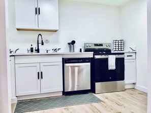 House, Multiple Beds, Patio, Garden View (Boardwalk Bungalow) | Private kitchen - Boardwalk Bungalow Combo Stay for 9 (League City)