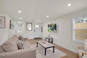 House, Multiple Beds, Patio, Garden View (Boardwalk Bungalow) | Living area - Boardwalk Bungalow Combo Stay for 9 (League City)