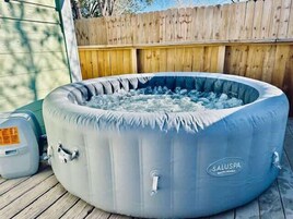 House, Multiple Beds, Patio, Garden View (Boardwalk Bungalow) | Outdoor spa tub