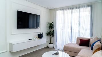 Deluxe-Apartment, Stadtblick | Wohnbereich