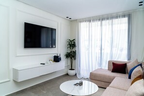 Apartament Deluxe, vistes a la ciutat | Sala d'estar