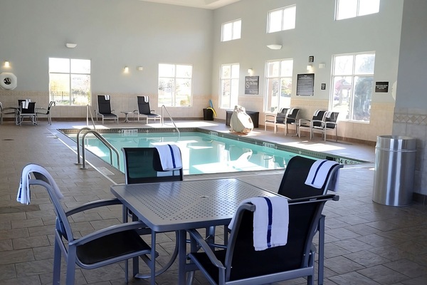 Unwind poolside with towels ready and plenty of loungers.