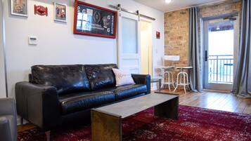 Suite de lujo, vistas a la ciudad | Zona de estar