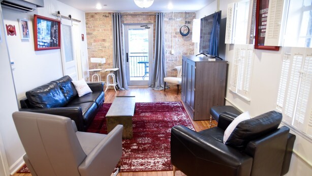 Suite Luxe, vue ville | Coin séjour
