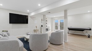 Smart TV, fireplace, books