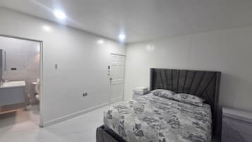 Deluxe Apartment, Courtyard View | Blackout drapes, free WiFi